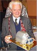 Dr. Zdenek Drahota received from his team in Prague an Oroboros cake at his 80th birthday